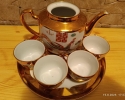 Prodám Porcelánový čajový set s čínskými motivy a zlatými detaily